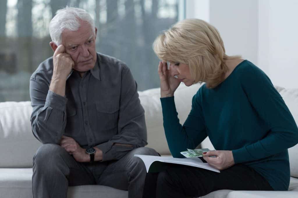 Picture of older couple troubled by timeshare agreement problems